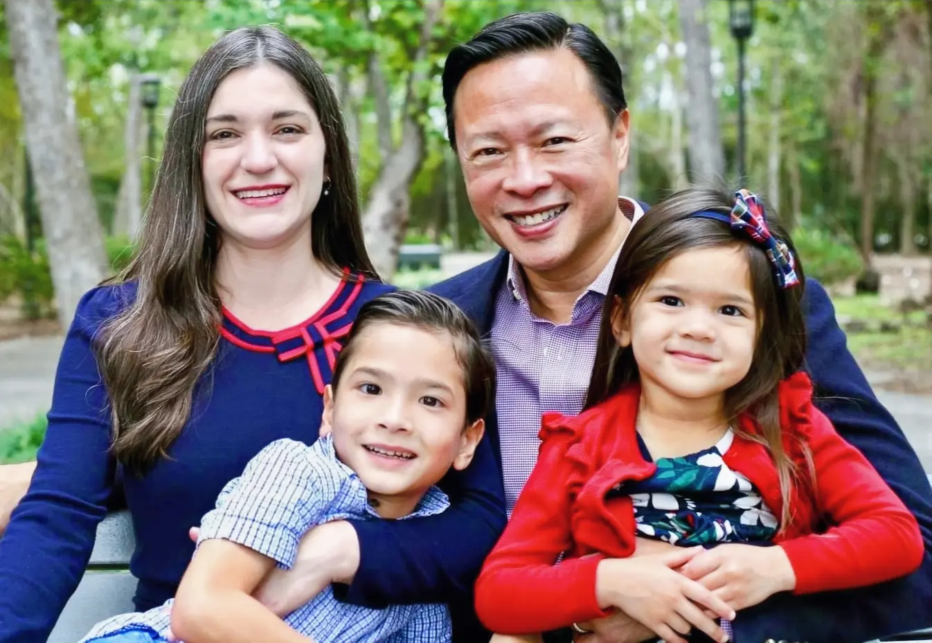 Nick Tran family photo in the woods